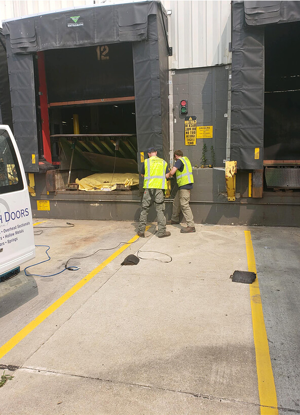 Altech team working on loading dock bay.